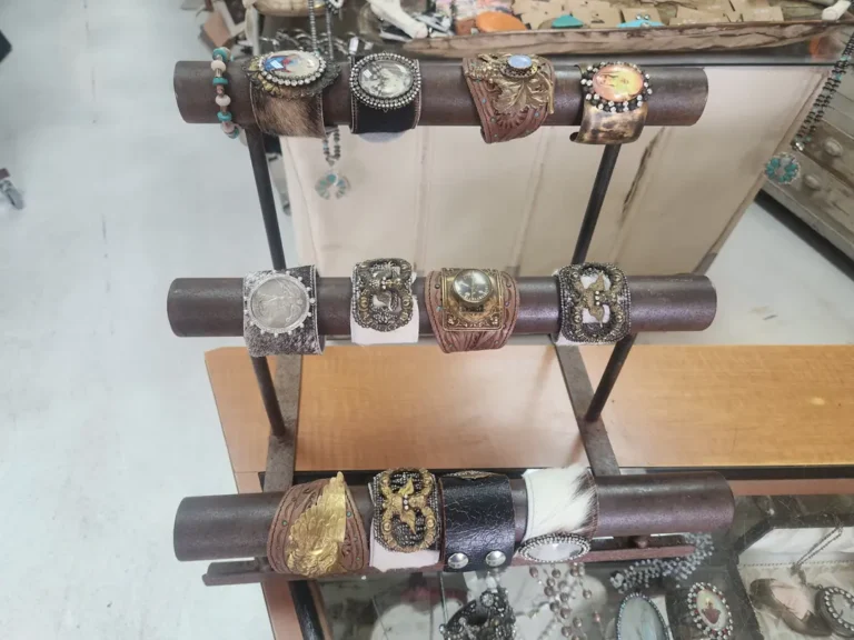 Assorted leather and metal bracelets with various designs