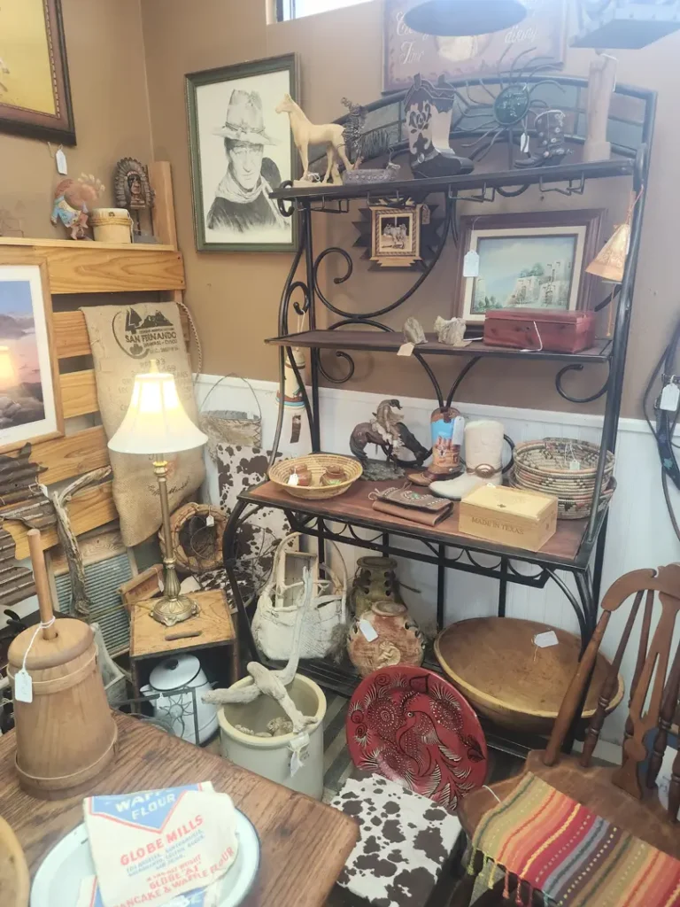 Rustic room with antiques lamp and cowboy items