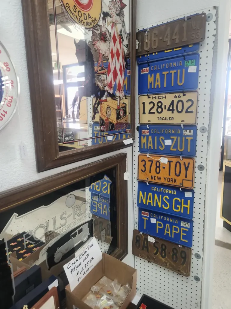 Curated exhibit of vintage license plates from California