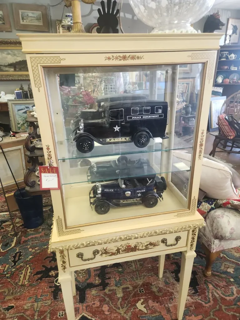 Vintage display case with antique treasures